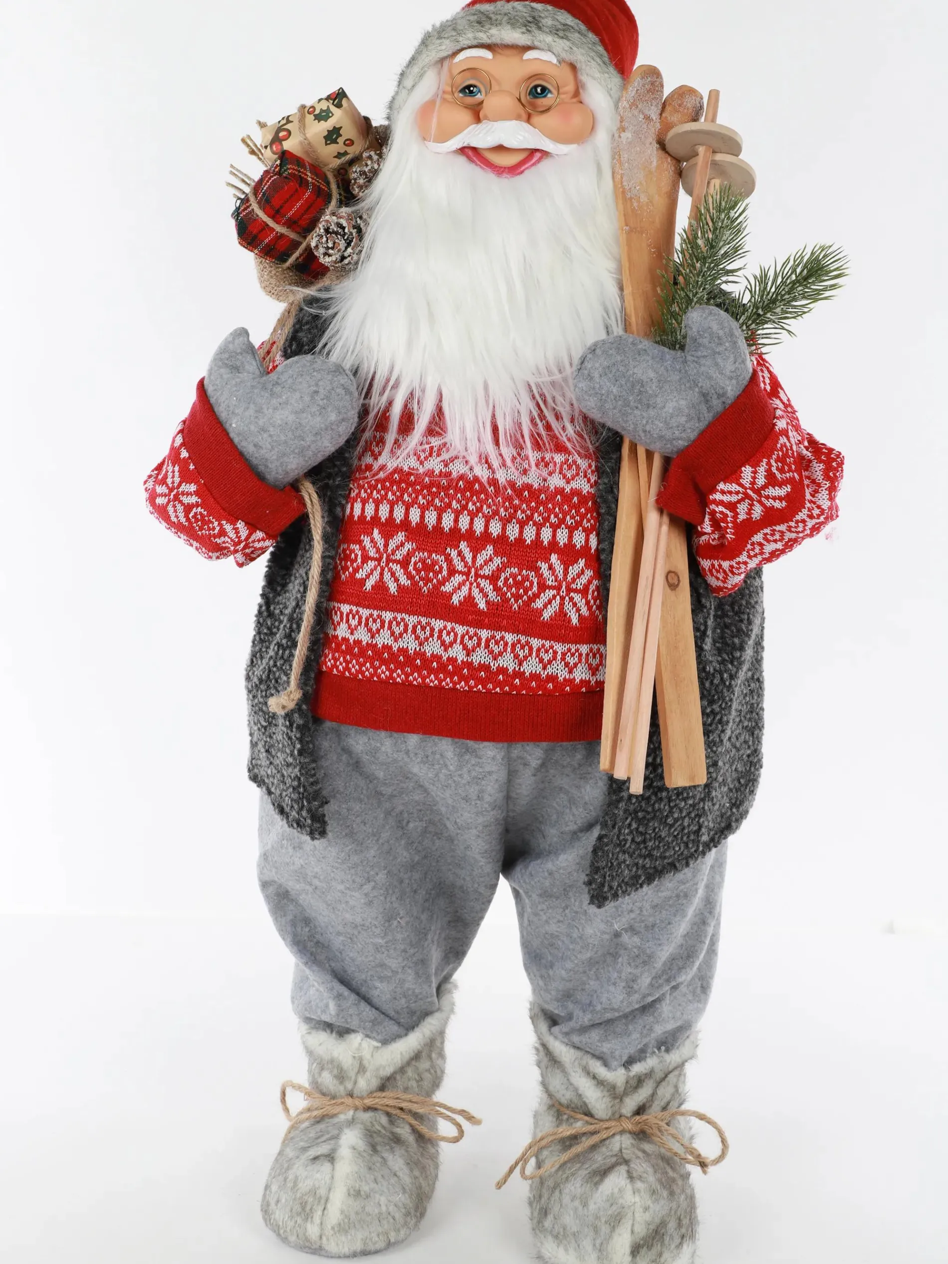 Weihnachtsmann stehend mit Skiern und Päckchen 60cm