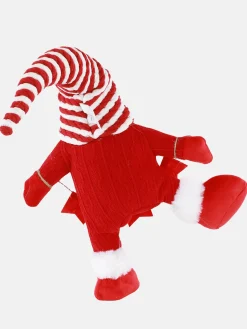 Weinachtsgnom auf einem Bein